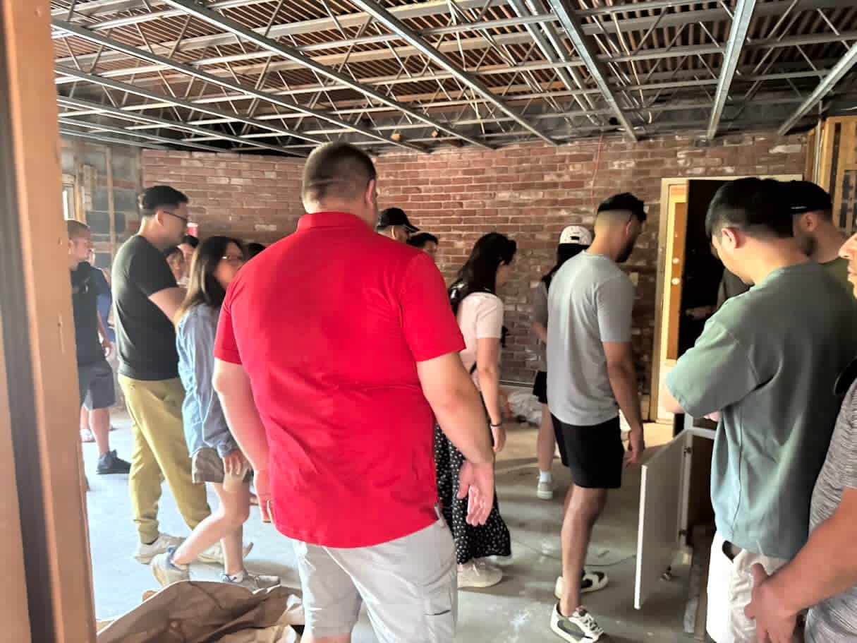 Active gut renovation with exposed brick, a value-add project